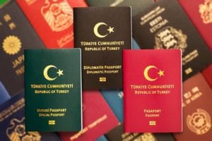 Turkish passports are burgundy, turquoise and green