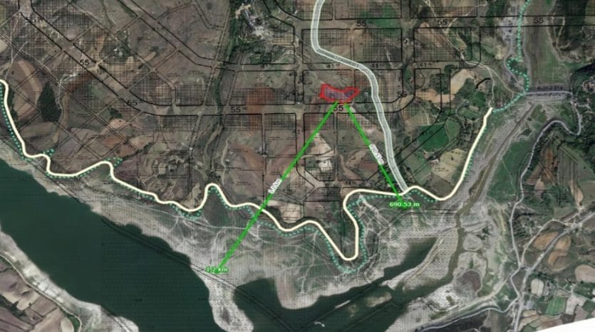 A plot of land for sale in Hacimashli Arnaoutkoy within the Yenişehir organization, its location appears from satellites before sorting